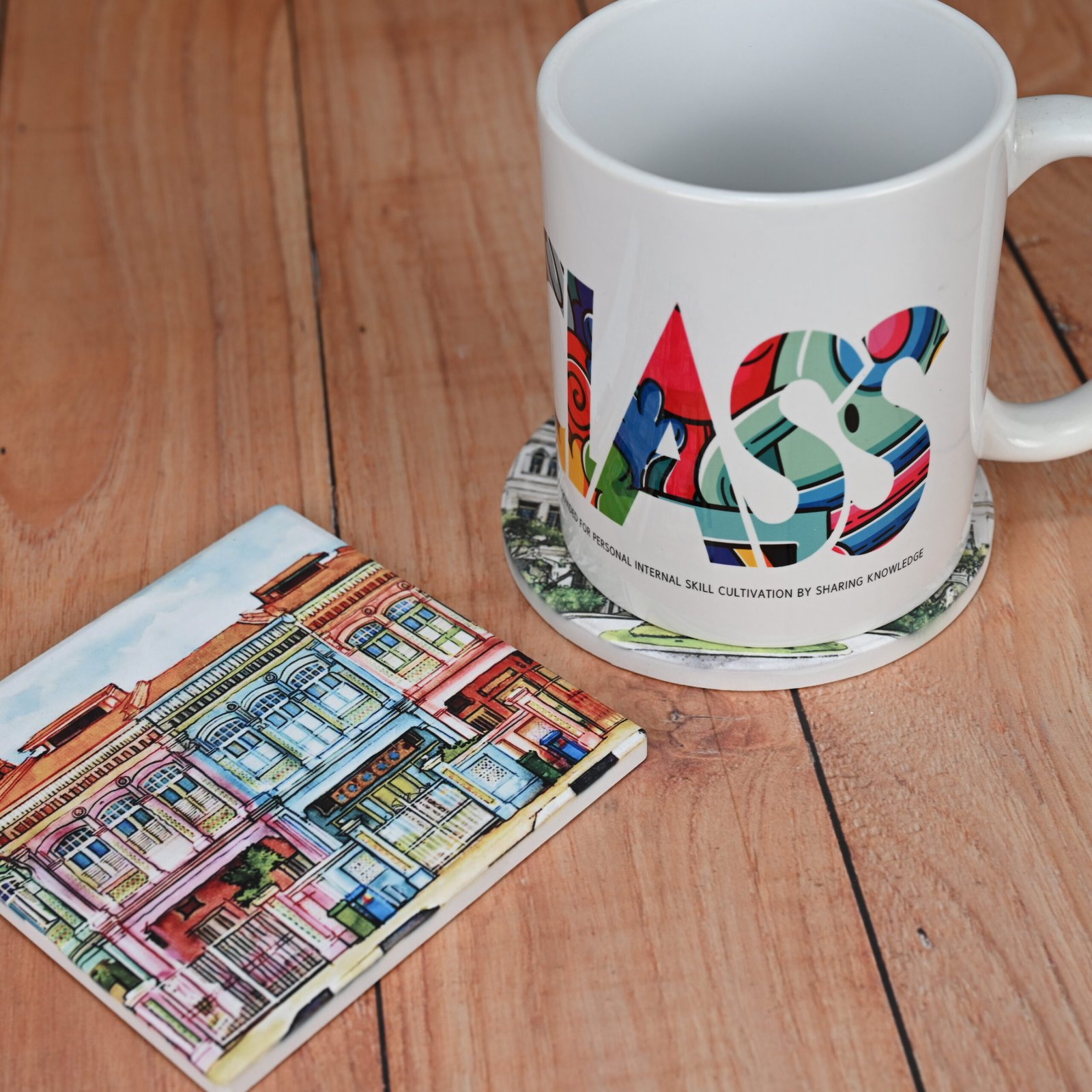 Stacks of branded cork coasters showing bulk production capability