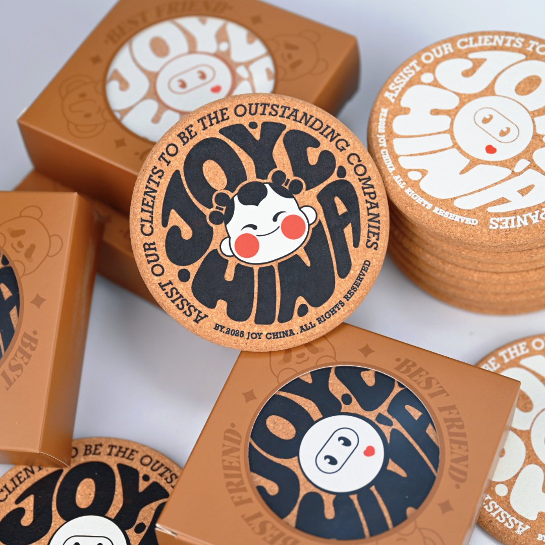 Hand holding custom cork coaster face-on showing full color print quality