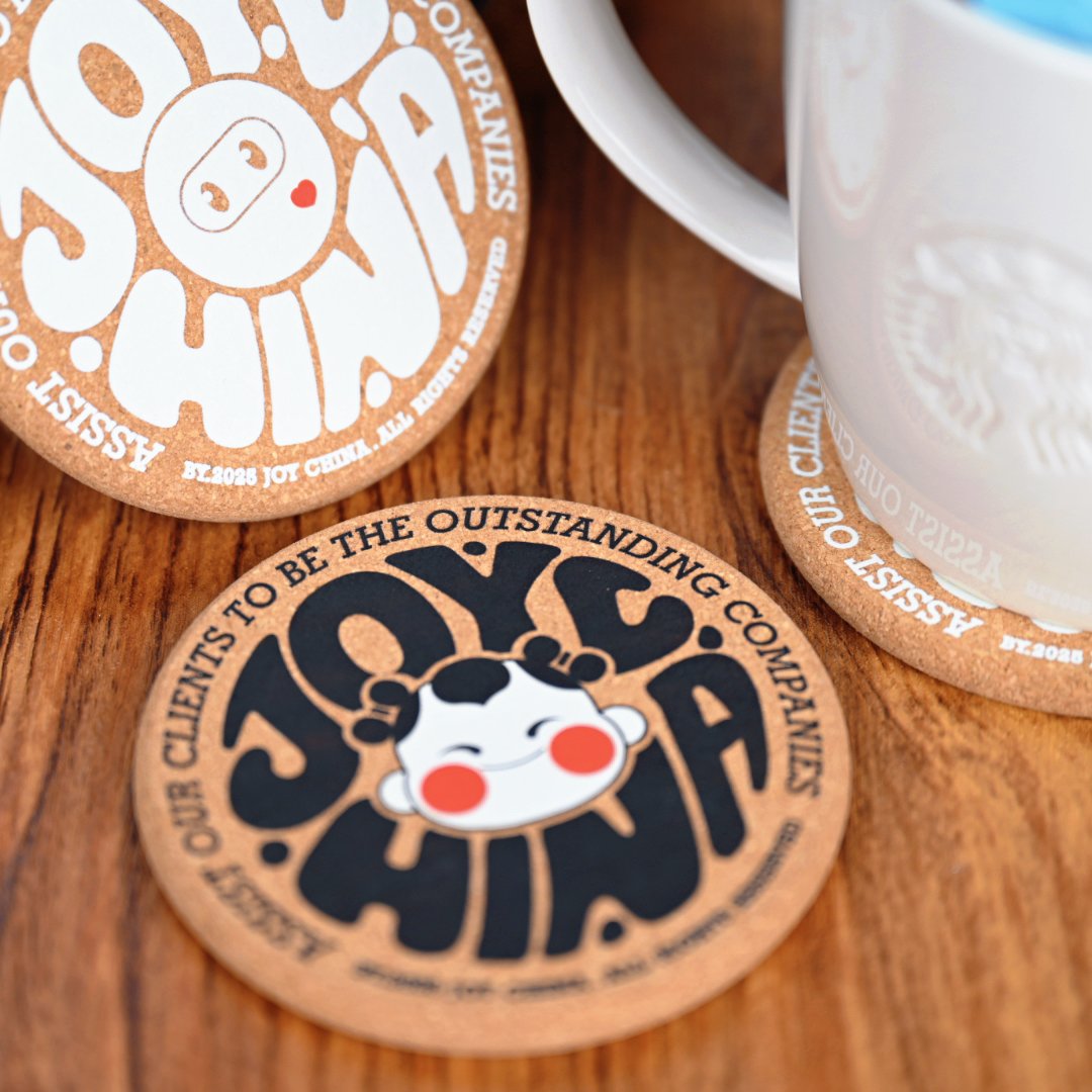 Cork coaster stack on white background showing natural cork texture and custom print