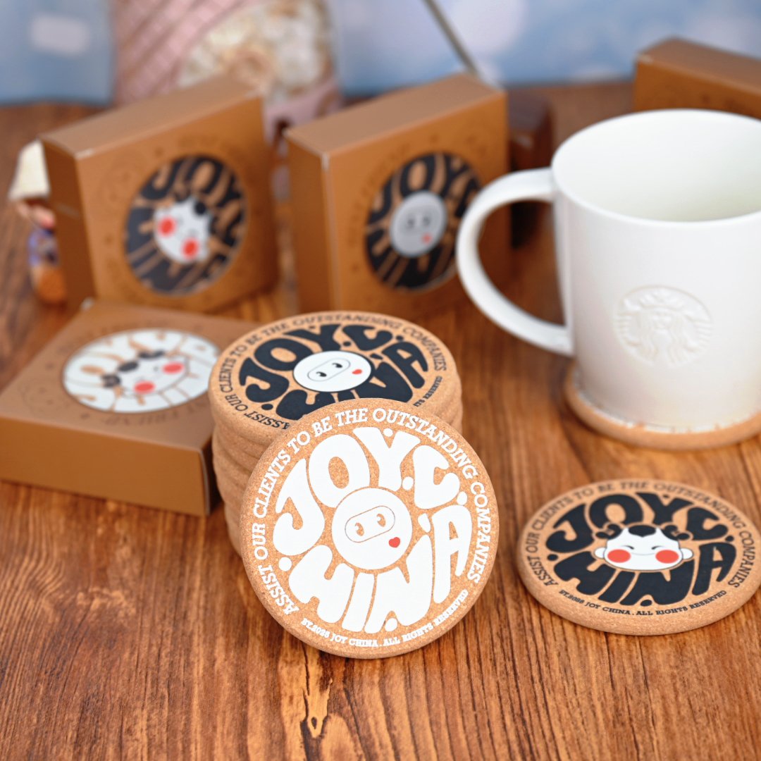 Custom printed 8mm cork coasters flat lay showing multiple client design variants