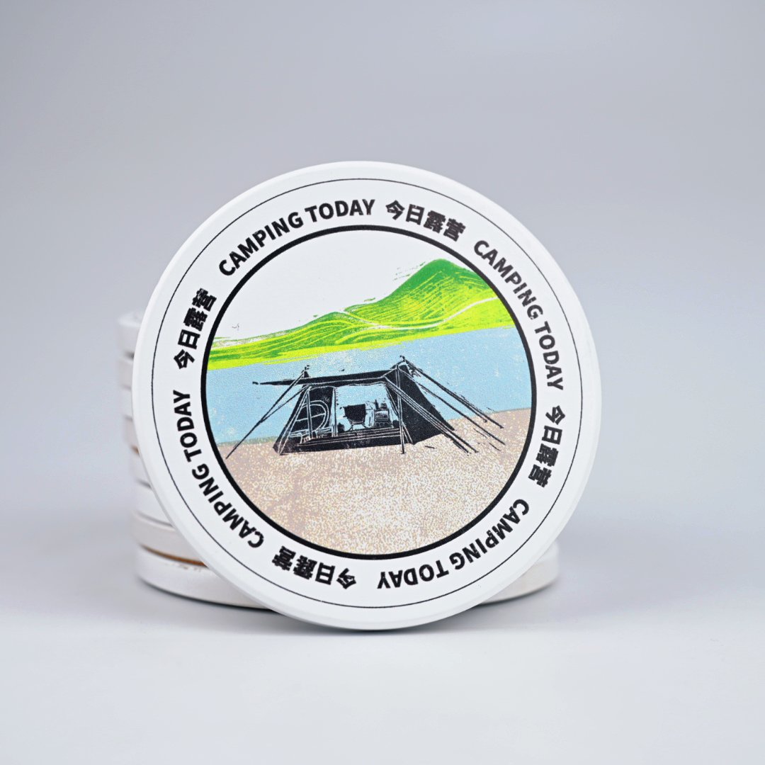 Ceramic coaster held in hand showing detail