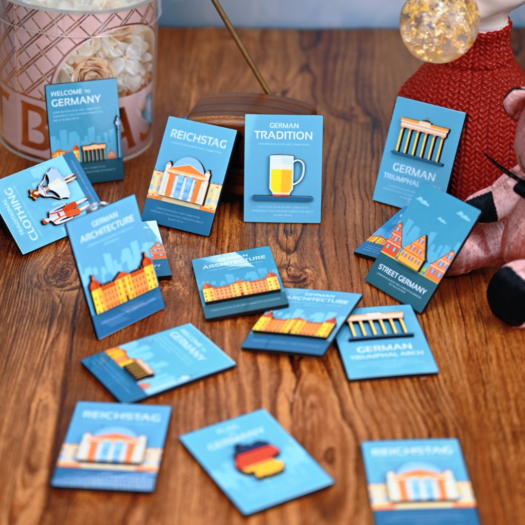 Multiple custom double-layer MDF souvenir fridge magnets showing various client designs