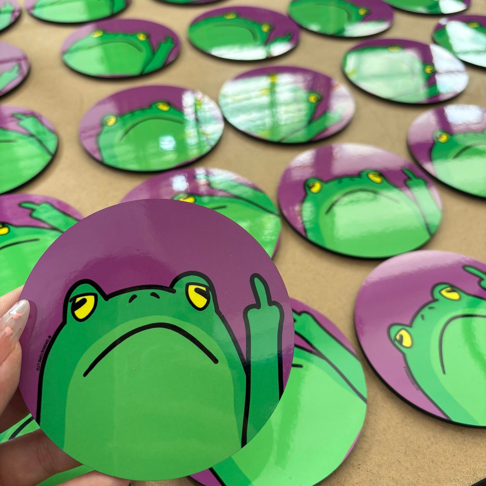 Custom MDF coaster with character artwork showing full-color sublimation print quality
