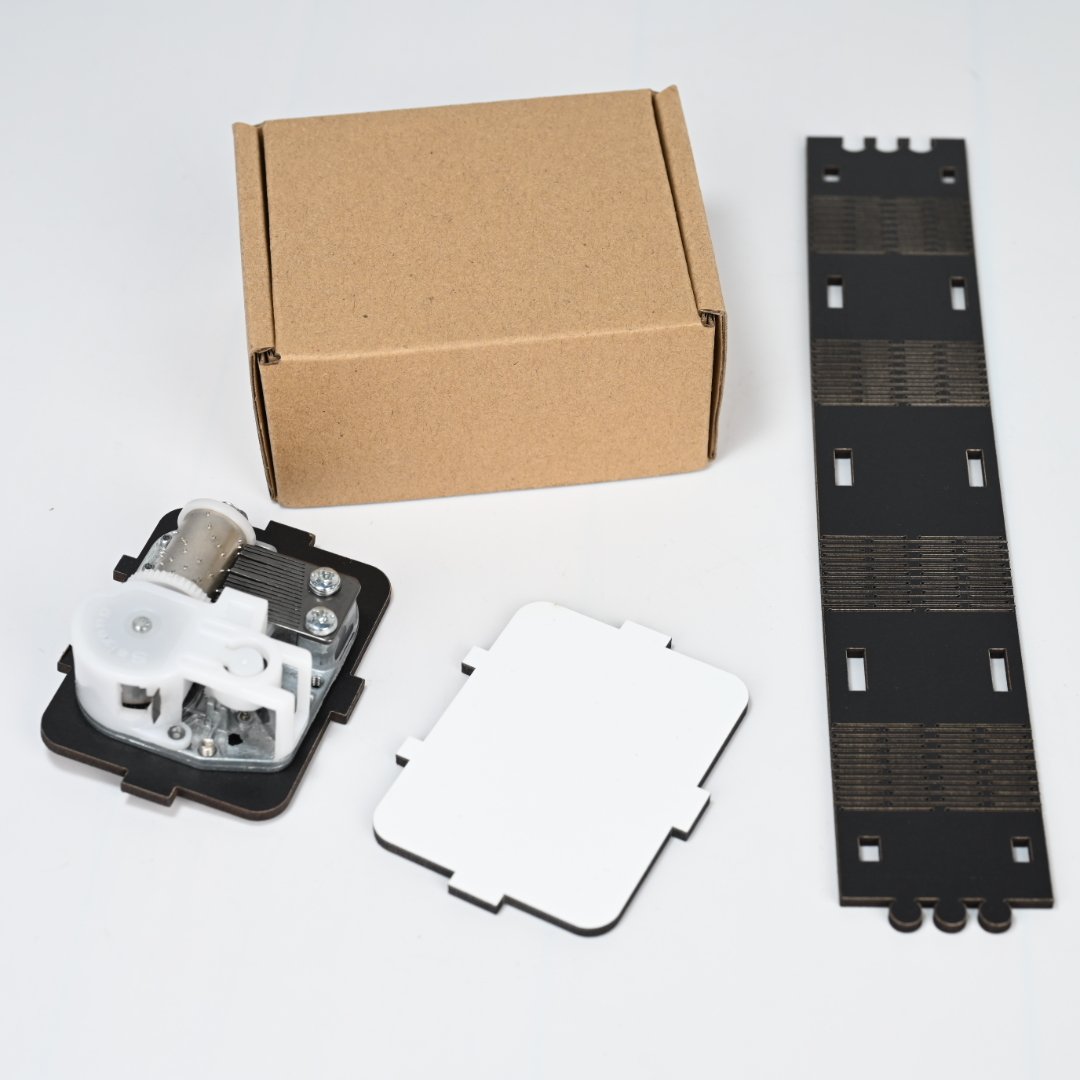 Custom music box showing blank white print panel ready for your design alongside finished product