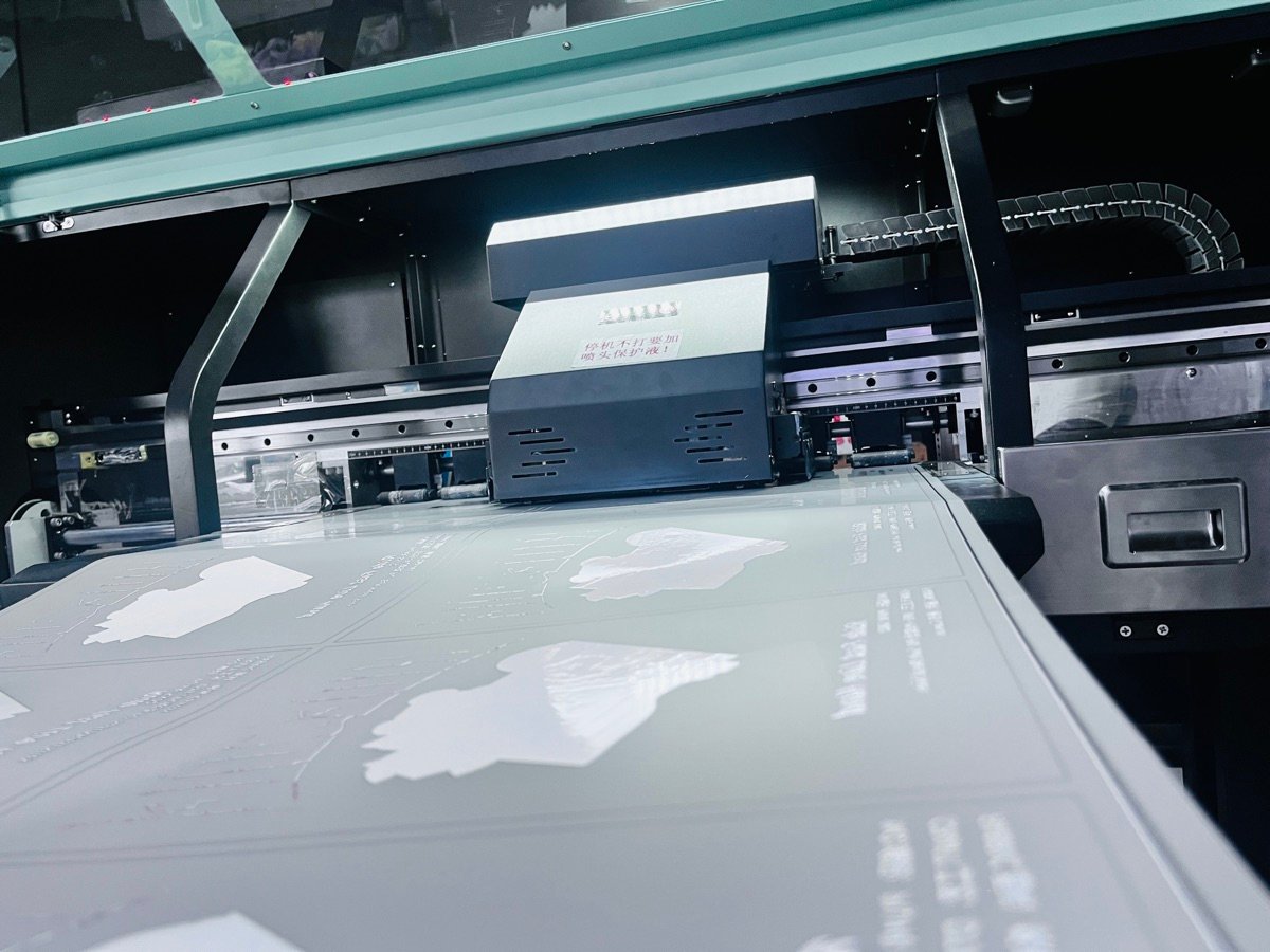 DTF printing machine printing custom garment designs