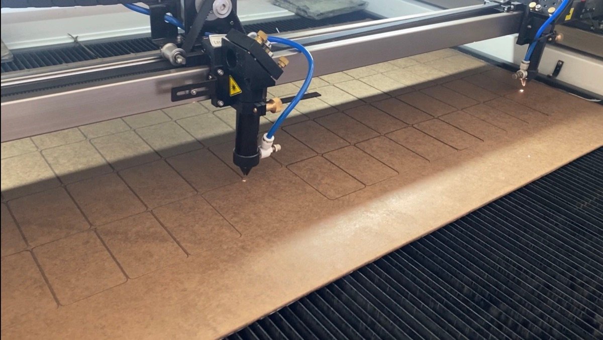 Dual-head laser cutting machine cutting MDF coasters