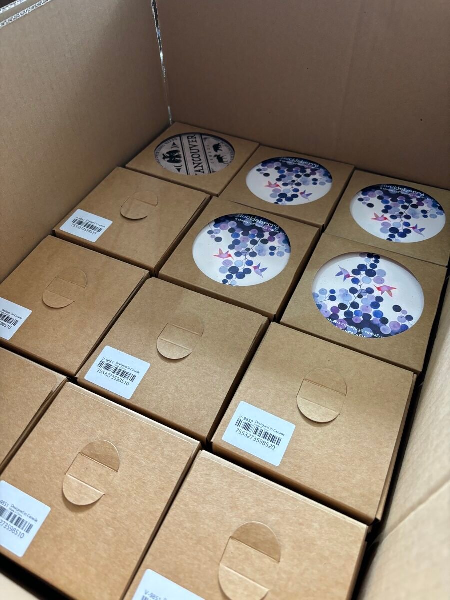 Cork coasters packed in retail gift boxes with barcode labels