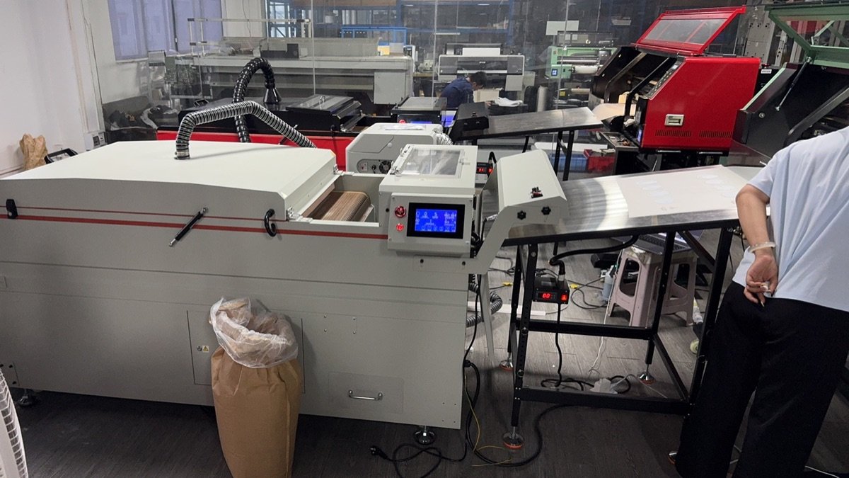 Print production room with multiple machines in operation Guangzhou factory