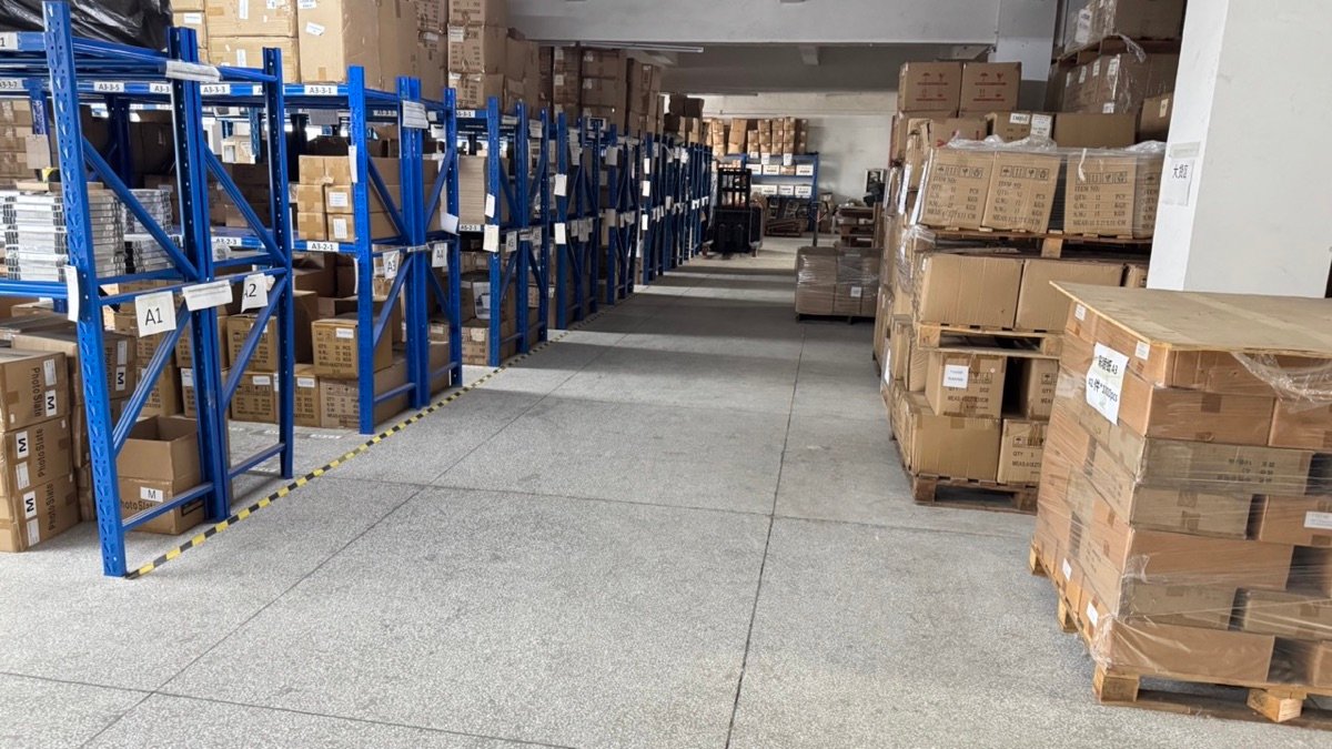 Warehouse with organized blue shelving system
